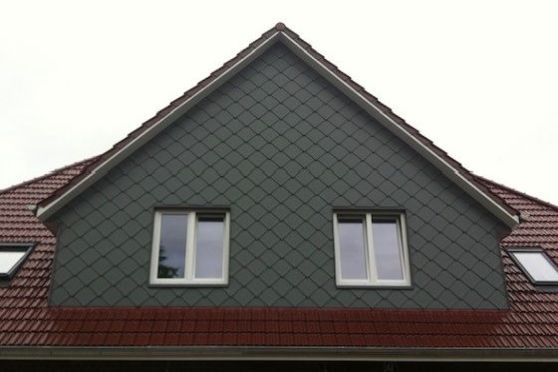 Dachgaubenbekleidung mit Kleinformatigen Aluminiumfassadenplatten.