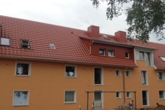 Energetische Dachsanierung eines Mehrfamilienhauses.